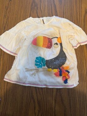 Mud Pie White Toucan Embroidered Top with Colorful Tassels